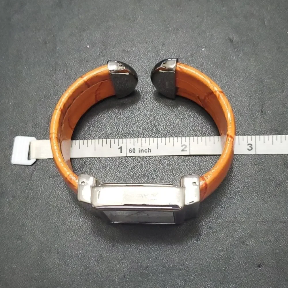 Avon wide cuff watch paprika silver tone IOB Needs Battery